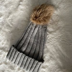 Grey pom pom winter hat